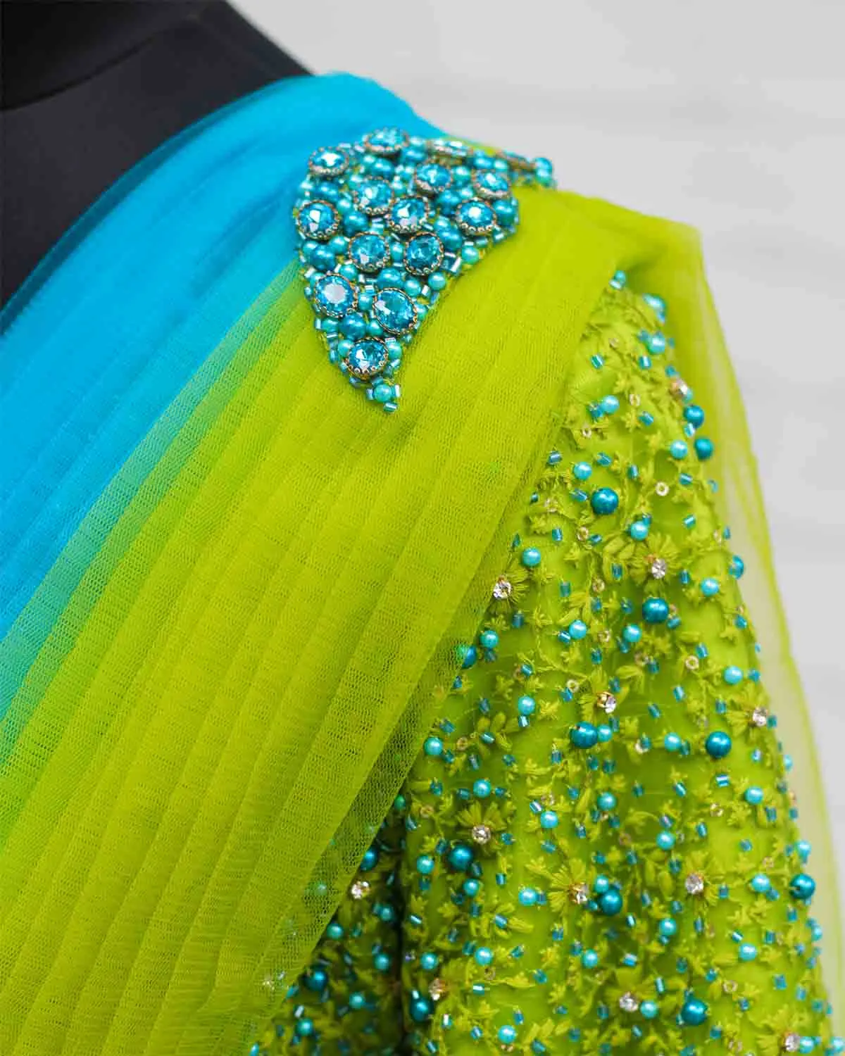 Sea blue and green color gradient gown with draped dupatta